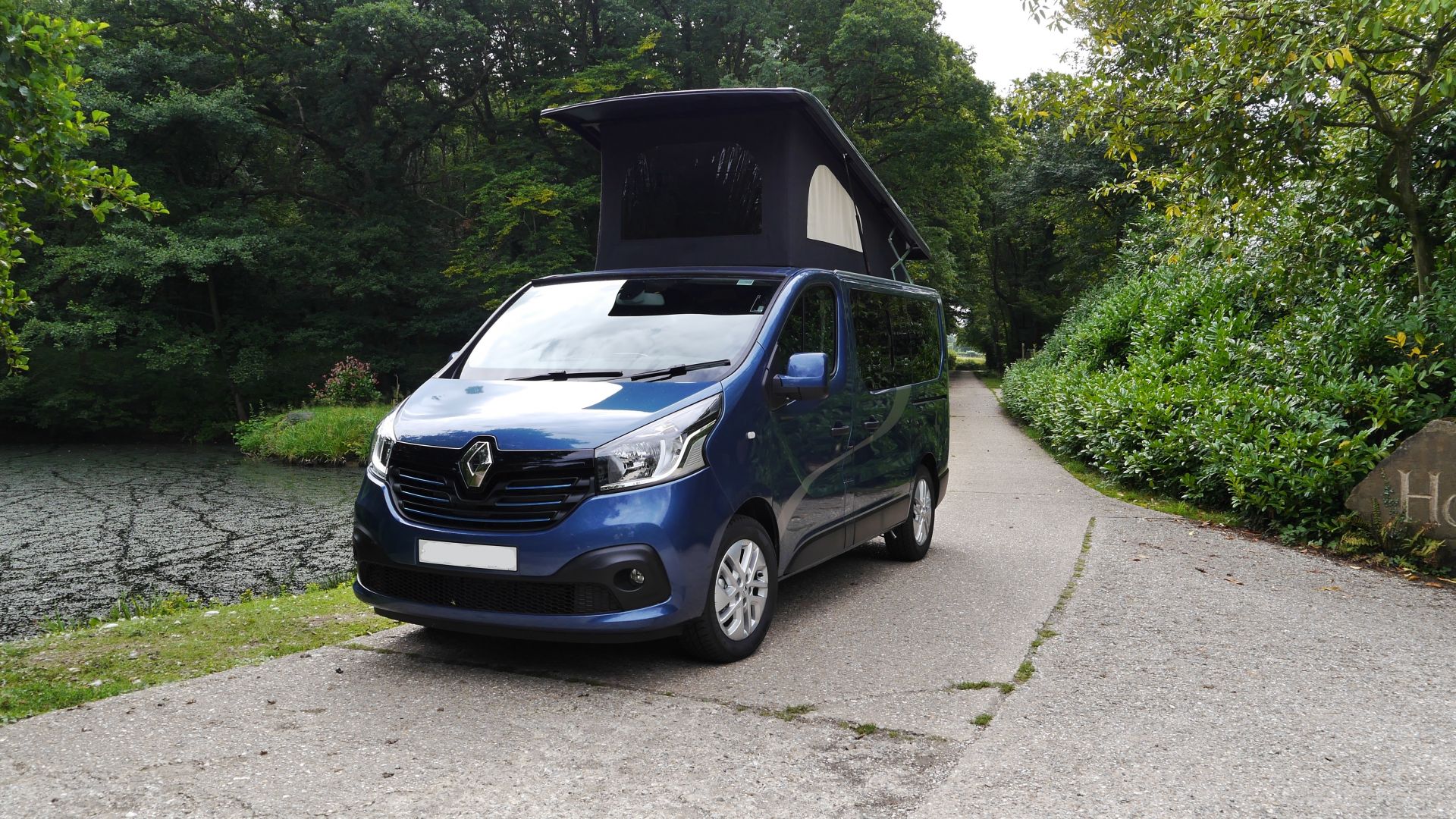 blog Blue Paradise Compact Sussex Campervans front view pop top.jpg