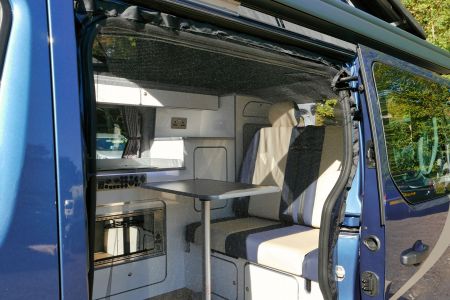 Sussex Campervans Manhattan camper, rock and roll bed, rail table, LPG tank, mosquito net.JPG