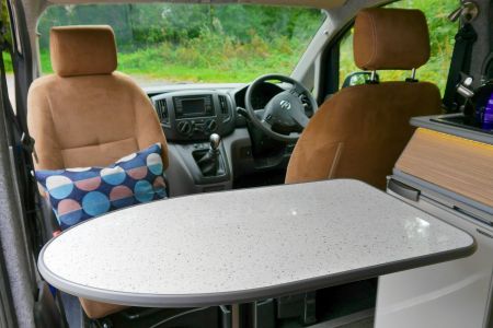 Nissan NV200 CamperCar Sussex Campervans front swivel dining cafe ecosuede seats.JPG