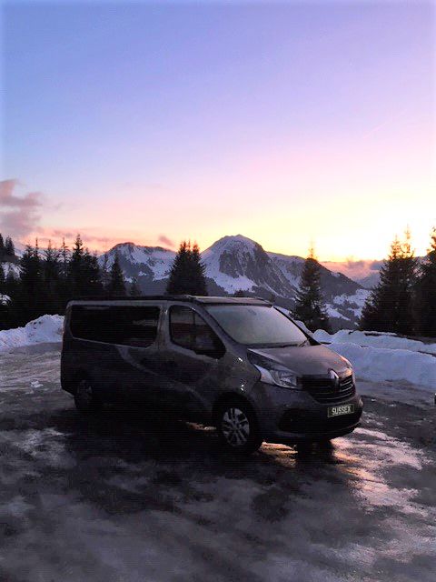 campervan parked in snowy ground