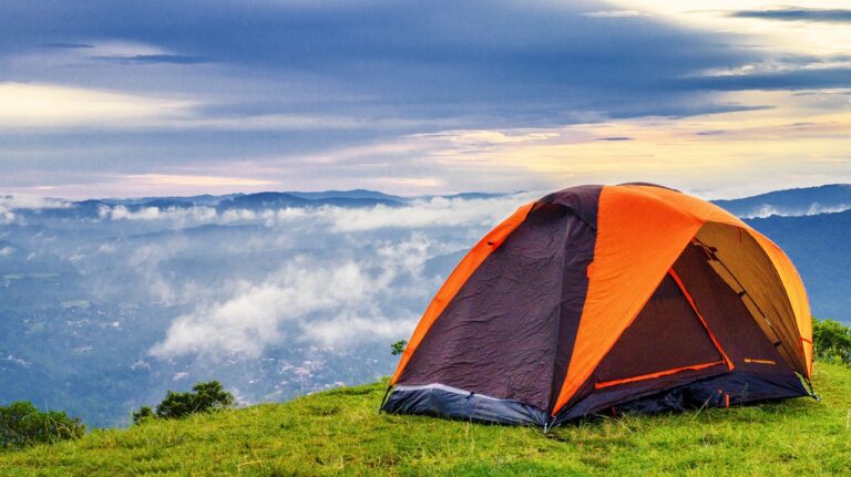 camping at the mountain top full of clouds